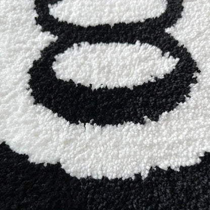Close-up of a black and white pattern on a textured surface