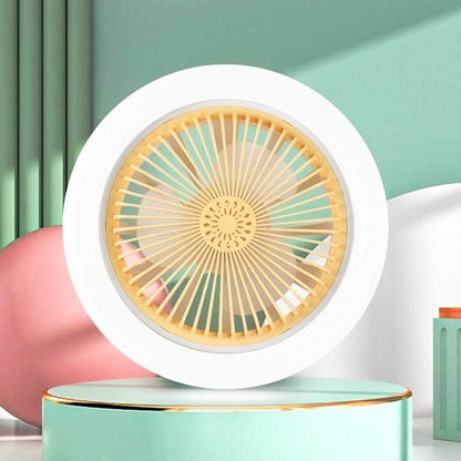Round fan with white frame and yellow center on a green platform against a light green background