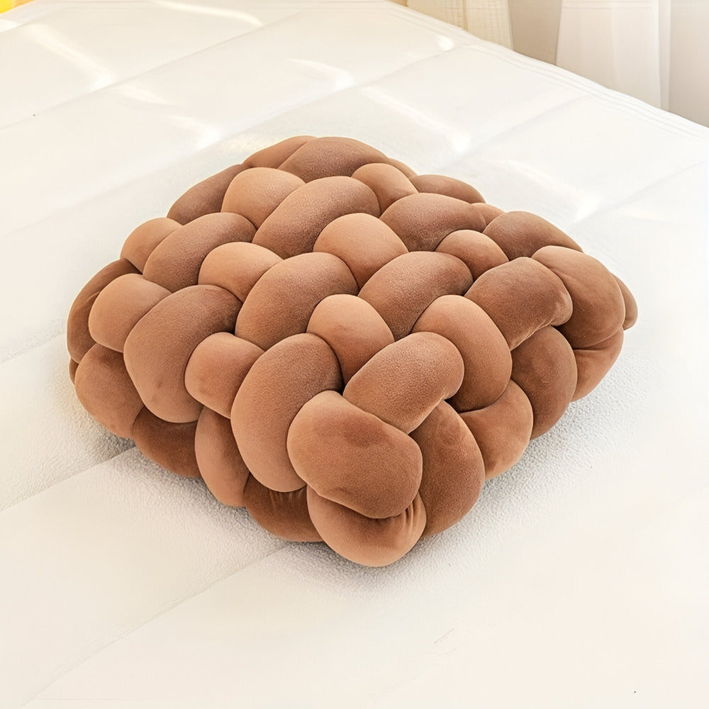 Stilvolles Kissen mit verziertem Knopfdetail