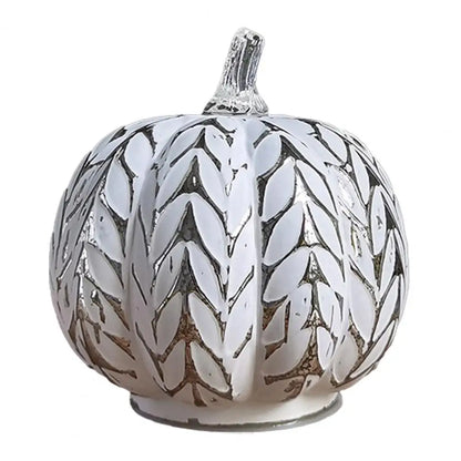 Kürbisdekoration aus warm leuchtendem Glas mit LED-Beleuchtung