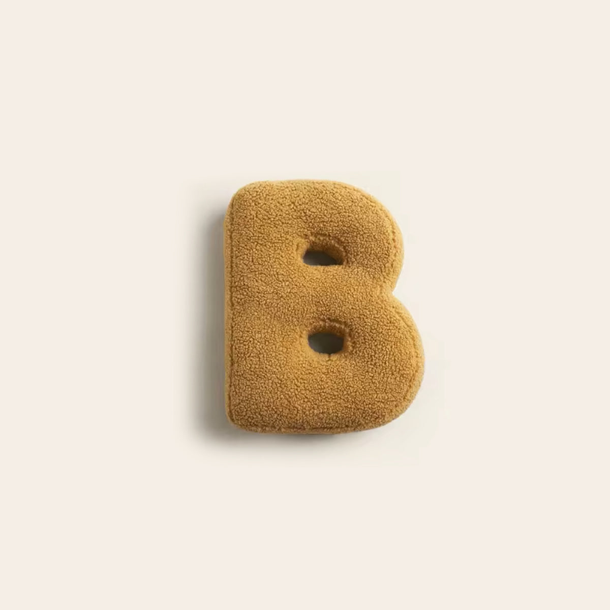 Buntes Alphabet-Kissen als Dekoration