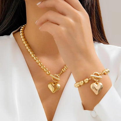 Perlenarmband und Halskettenset mit Herzanhänger 