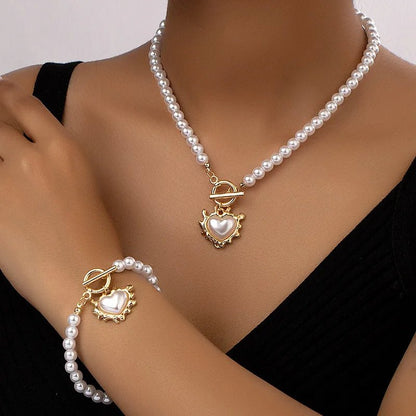 Perlenarmband und Halskettenset mit Herzanhänger 