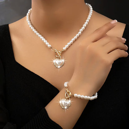 Perlenarmband und Halskettenset mit Herzanhänger 