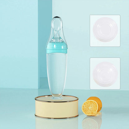 Babyflasche mit weichem Löffel