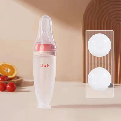 Babyflasche mit weichem Löffel